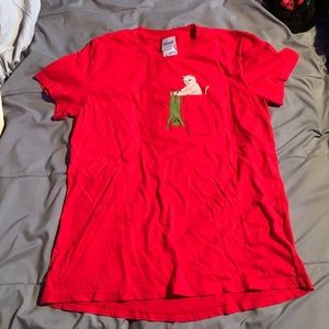 red ripndip shirt with pocket on front